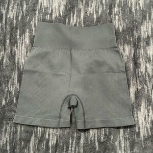 Never worn cute grey shorts workout stretchy size medium  excellent condition